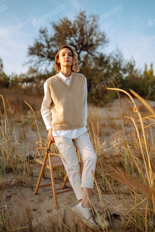Preview: Portrait of elegant, luxury woman posing in nature. People, lifestyle, relaxation concept.