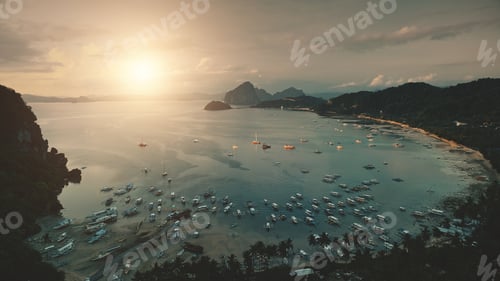 Preview: Ocean pier at sun light aerial: ships, boats, yachts at tropic paradise resort. Philippines landmark