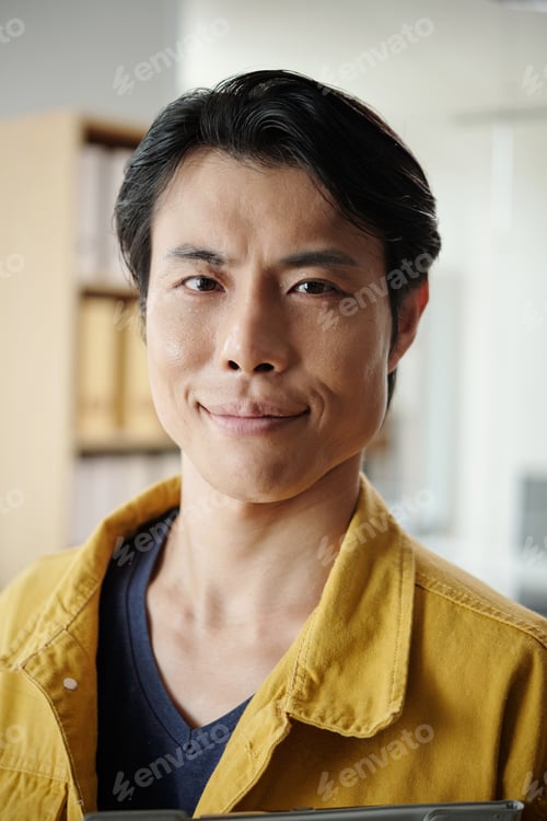 Preview: Portrait of Cheerful Asian Man