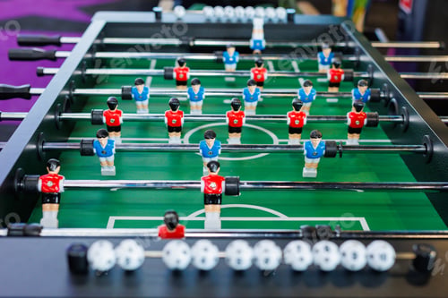 Preview: Table football in a modern game room in close-up.