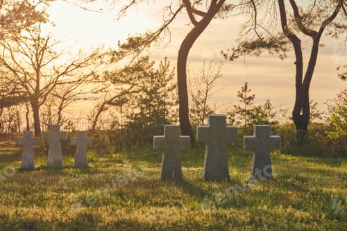 Preview: Stone crosses at sunset in German military cemetery, Europe