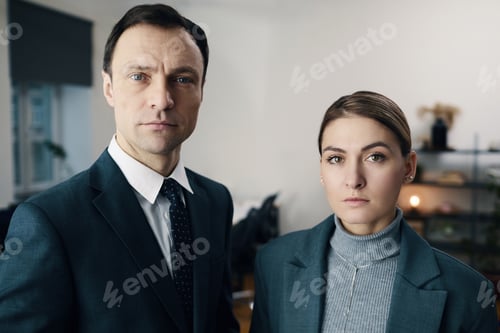 Preview: Business Couple Working In Office
