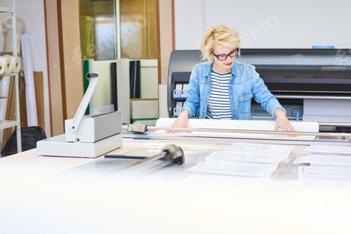 Preview: Young Woman Working in Printshop