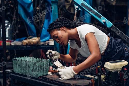 Preview: Auto mechanic are repair auto engine is problems at car repair shop.