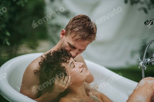 Preview: Millennial in love happy couple in relaxation have fun and hugs date