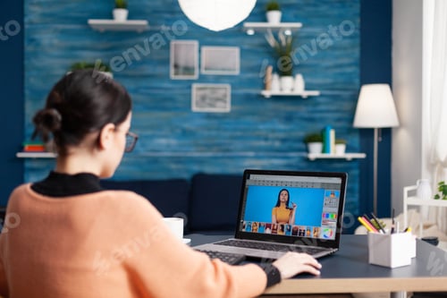 Preview: Student editor retouching professional photo working on color grade