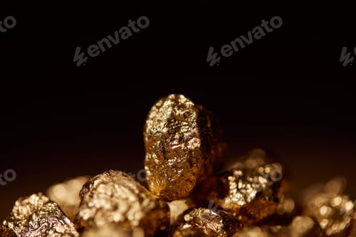 Preview: selective focus of golden stone isolated on black