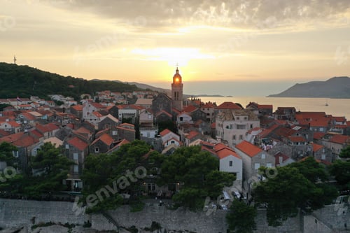 Preview: Scenic aerial view of a vibrant town with a stunning blue sea in the background in Croatia