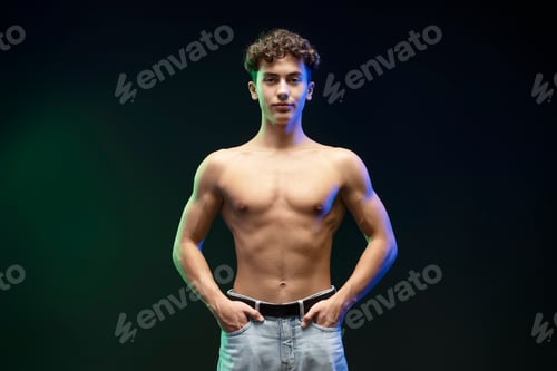 Preview: Confident, attractive teen boy with naked torso, bare body, looking at camera, fashion model