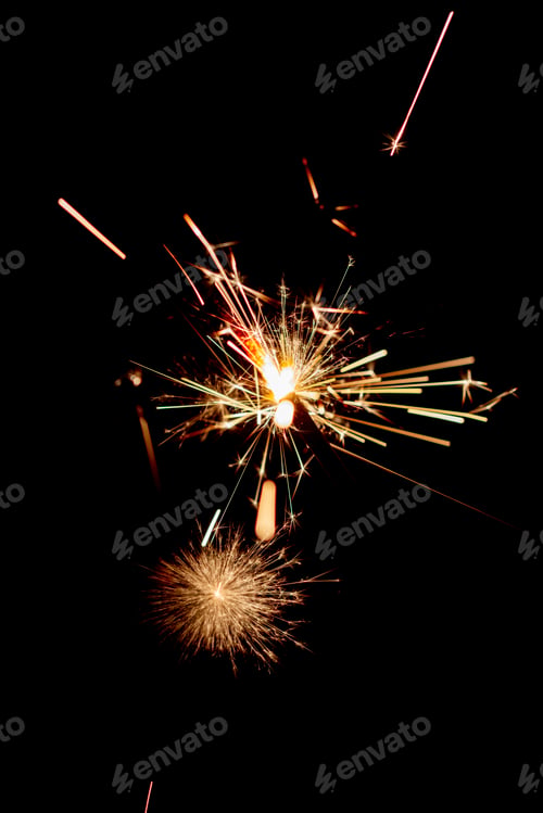 Preview: One bengal fire sparkles against the black background.
