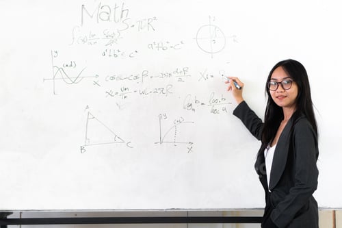Preview: asian teacher write on white board