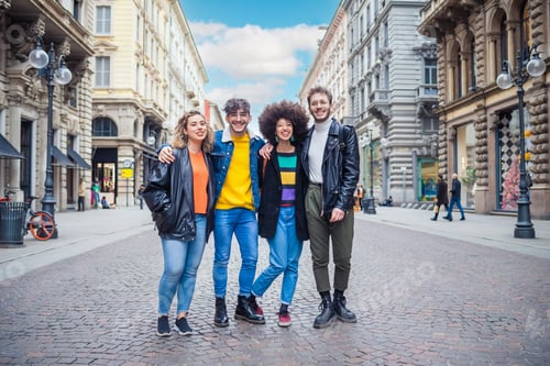 Preview: Group of diverse multithnic friends schoolmate or tourist outdoors having fun hugging