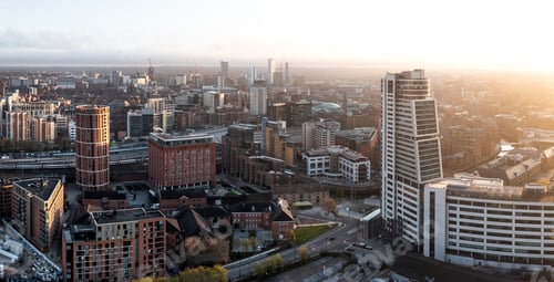 Preview: Aerial panorama of Leeds cityscape skyline with an early morning sunrise