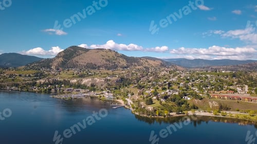 Preview: Aerial shot of the Okanagan Lake with Penticton city on the shore and hills in the background