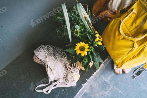 Preview: Fresh Produce and Yellow Bag on Concrete Floor