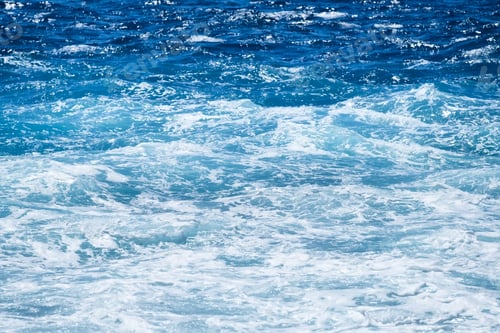 Preview: Waves and blue water as a background. View at the ocean surface.