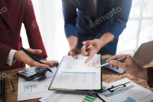 Preview: Close up of hands business people working together in boardroom, brainstorming, discussing