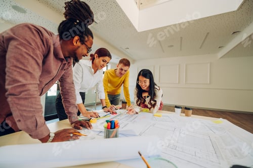 Preview: Diverse group of engineers or architects having a meeting in an office