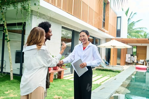 Preview: Young couple with areal estate agent