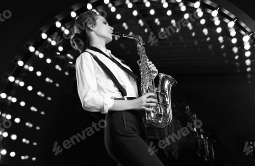 Preview: Portrait Of Gorgeous Brunette Model Woman In Fashionable Formal Suit With Saxophone Playing On