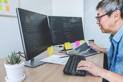Preview: Senior Professional programmer working at developing programming and website working in a software