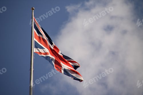Preview: Union Jack flag against blue sky
