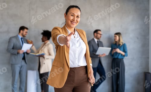 Preview: Happy office staff, success employee giving hand for shaking. Business people offering handshake