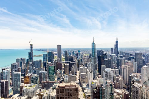 Preview: Chicago city skyscrapers aerial view, blue sky background. Skydeck observation