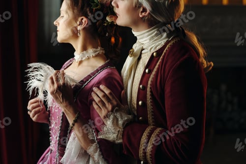Preview: Caucasian Young Adult Man Embracing Caucasian Young Adult Woman Indoors