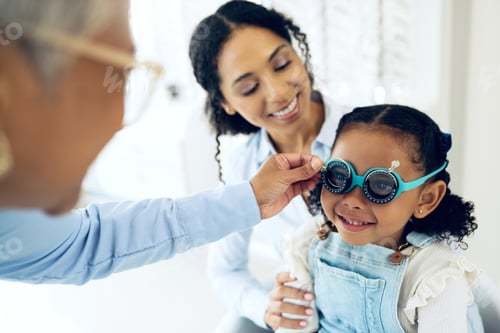 Preview: Trial lens, optometry and optometrist with child and mother at eye care appointment for vision test