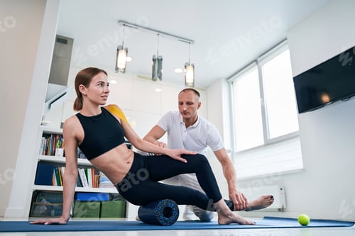 Preview: Woman Receiving Physical Therapy in a Bright Home