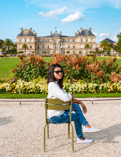 Preview: Asian women visiting Le Jardin Luxembourg park in Paris during summer in the city of Paris France