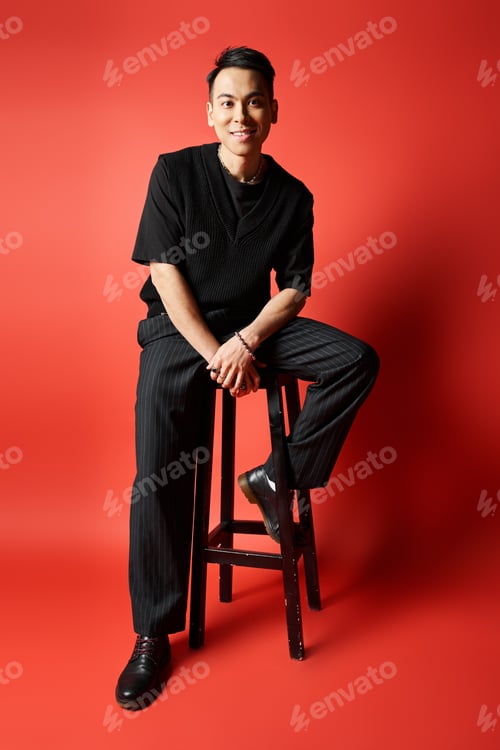 Preview: The stylish man on red stool