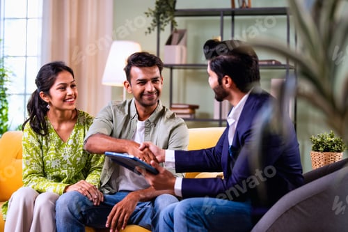 Preview: Business Meeting with Man and Woman Shaking Hands