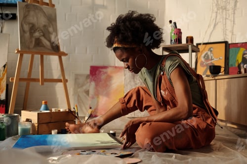 Preview: Concentrating Artist Painting in Studio Setting