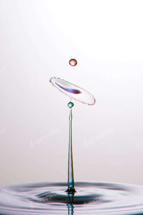 Preview: Splash of colorful liquid with high speed flash