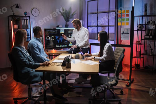Preview: Multiracial colleagues having meeting about financial report