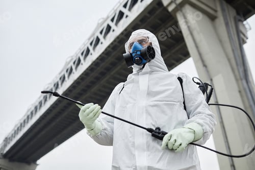 Preview: Man in Protective Gear Outdoors