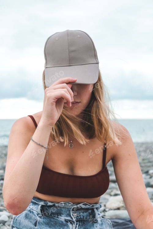 Preview: Traveler girl resting on the beach near the sea. Eco travel, taking care of yourself physical and