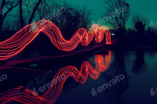 Preview: View of abstract colorful spiraling light waves over the lake