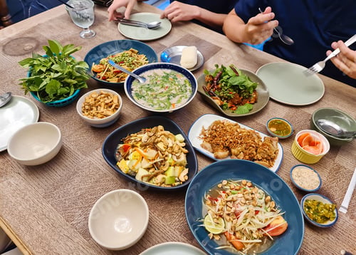 Preview: Thai food with papaya spicy salad, fruit salad, crispy pork, spicy pork soup, sticky rice