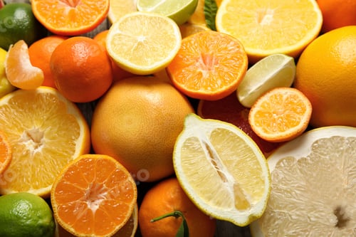 Preview: Different citrus fruits as background, top view