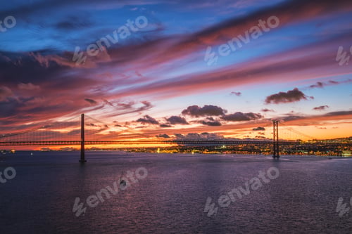 Preview: View of 25 de Abril Bridge at evening. Lisbon, Portugal