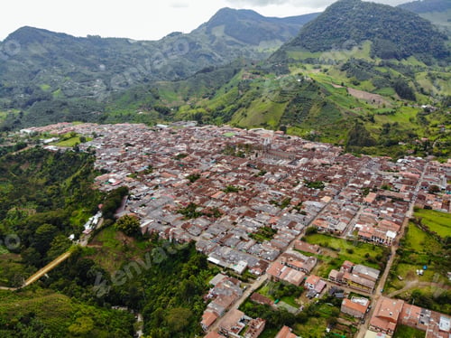 Preview: Houses Surrounded by Green Mountains, Trees and Plants