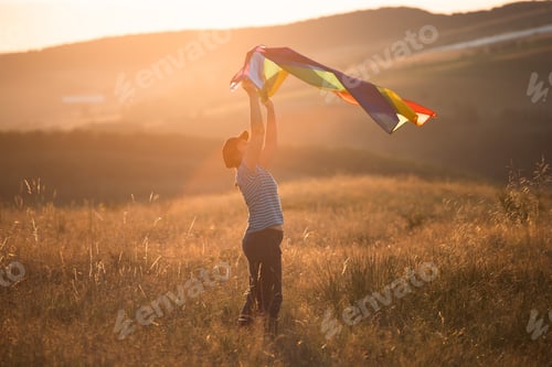 Preview: Young woman with LGBT flag.