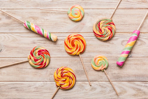 Preview: Set of colorful lollipops on colored background. Summer concept. Party Happy Birthday