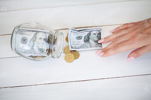 Preview: Donate conception. Jar with money on white wood background