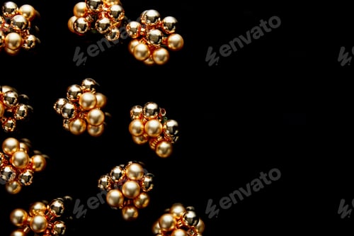 Preview: top view of shiny golden Christmas decoration isolated on black with copy space