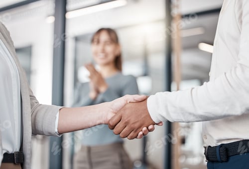 Preview: Shot of two unrecognizable businespeople shaking hands in an office at work