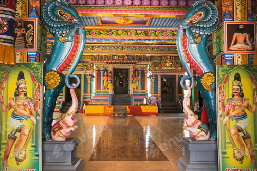 Preview: Part of a beautiful and colorful Indian temple in Mauritius Island. Close-up on sculptures and